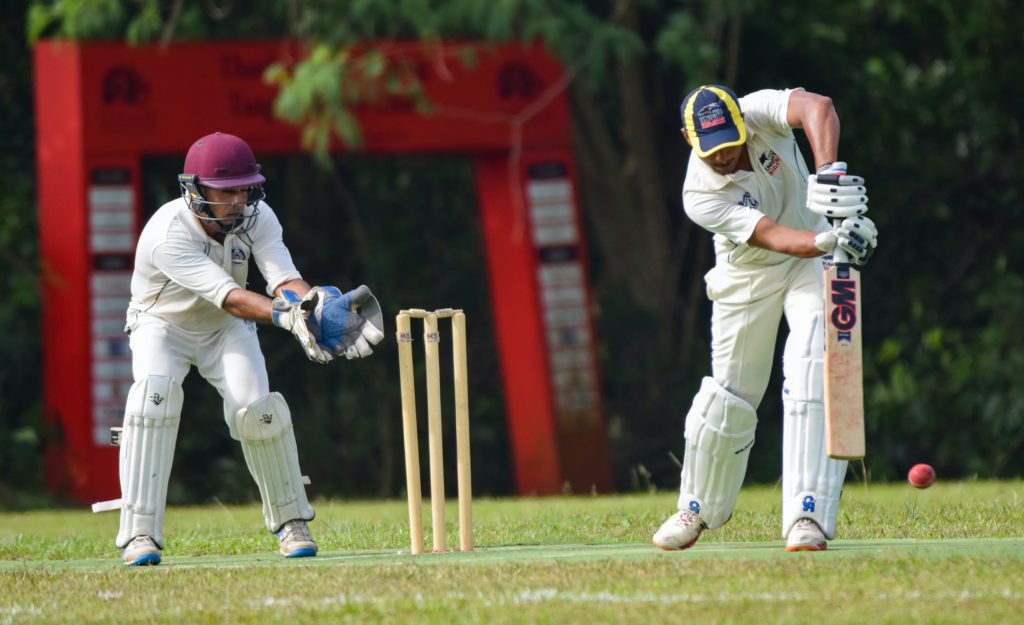 Batsman and a wicket keeper at the stumps