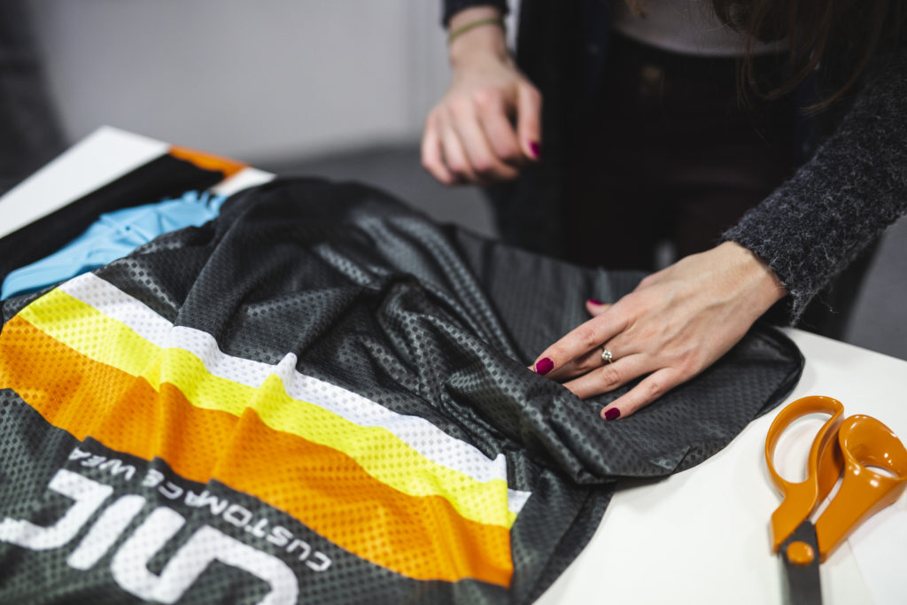 Woman creating custom teamwear